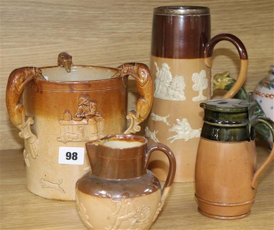 A Doulton stoneware tyg and three other stoneware items